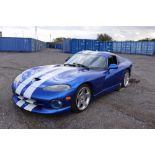 A 1997 Dodge Viper, left hand drive, 8000cc Coupe in Blue with white stripes,