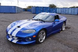 A 1997 Dodge Viper, left hand drive, 8000cc Coupe in Blue with white stripes,