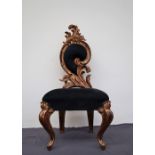 A gilt decorated bedroom chair,