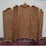 A large gilt decorated and double caned five fold screen,