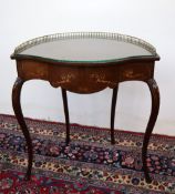 A George V mahogany corner table of bowed serpentine form,