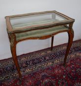 A 19th century bijouterie table in the manner of Paul Sormani,