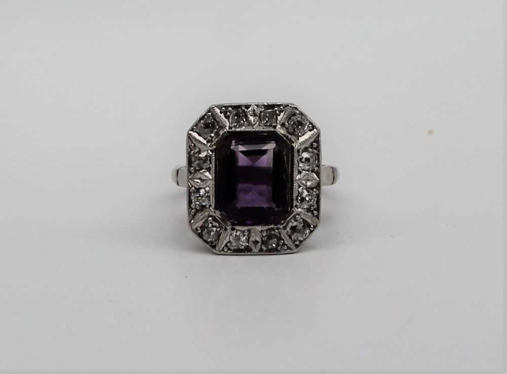 An amethyst and diamond ring,