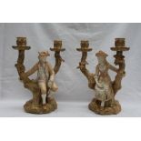 A pair of Royal Worcester Watteau style figural candelabra,