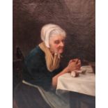 19th century British School An elderly lady seated at a table Oil on canvas 34 x 26cm