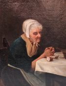 19th century British School An elderly lady seated at a table Oil on canvas 34 x 26cm