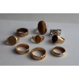 Three 9ct yellow gold wedding bands, together with 9ct gold signet rings, tigers eye signet ring,