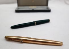 A Parker Victory fountain pen, in green with a 14k knib,