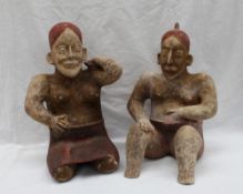 A pair of pre-Columbian type Jalisco style bichrome pottery figures,