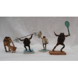 Taxidermy - a set of four toads in various poses, including a weight lifter, newspaper seller,