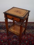 A late 19th century walnut side table of rectangular form decorated with carved edges,