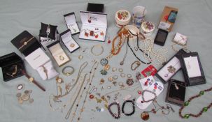 Assorted costume jewellery including watches, pendants, necklaces,