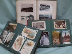 Three postcard albums containing circa 600 postcards, mainly scenic including Worcester, Torquay,