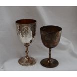 A Victorian silver goblet, decorated with scrolling leaves on a ring turned stem and spreading foot,