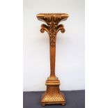 A large gilt decorated pillar,