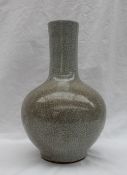 A Chinese crackle glaze vase, of baluster form, to as light green ground, 34.