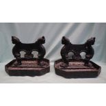 A pair of cast iron leopard head boot scrapes, 36cm wide x 28.