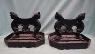 A pair of cast iron leopard head boot scrapes, 36cm wide x 28.