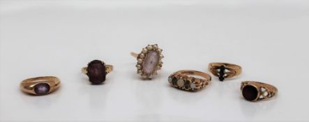 An amethyst set ring, the oval faceted stone to a 9ct yellow gold shank,