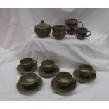 A Harry Davies for Crowan pottery part tea set comprising four tea cups, a tea bowl, five saucers,