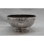 A George III Scottish bowl on a pedestal foot with rococo foliate decoration, gilded interior,