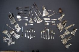 A Peruvian Camusso silver flatware service, comprising twelve fish forks, twelve fish knives,