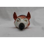 A 19th century fox mask stirrup cup,