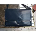 CARTIER - Sac en cuir bleu marine. 20 x 28,5 cm -