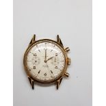 Montre chrono en or jaune 18k à remontage manuel. - Poids brut : 41,9 grs -