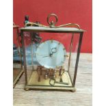 Pendule en laiton. 22 x 19 x 11 cm -