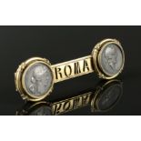 High Karat Gold "Roma" Brooch with Ancient Coins