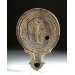 Roman Pottery Oil Lamp - Eros Playing Lyre