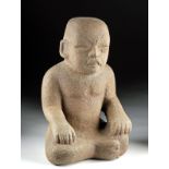 Important Olmec Stone Seated Figure of a Child