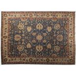 TABRIZ After 1900 Wool and cotton 383 x 285 cm A hand-woven Persian rug featuring a rich pattern