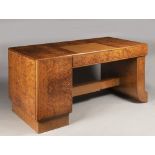 AN ART DECO DESK Cca 1930 Bird's-eye elm, brass and leather 80 x 80 x 166 cm This bird’s eye