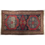 CAUCASUS 1900 Russian Federation Wool and cotton 370 x 218 cm A hand-woven rug featuring a geometric