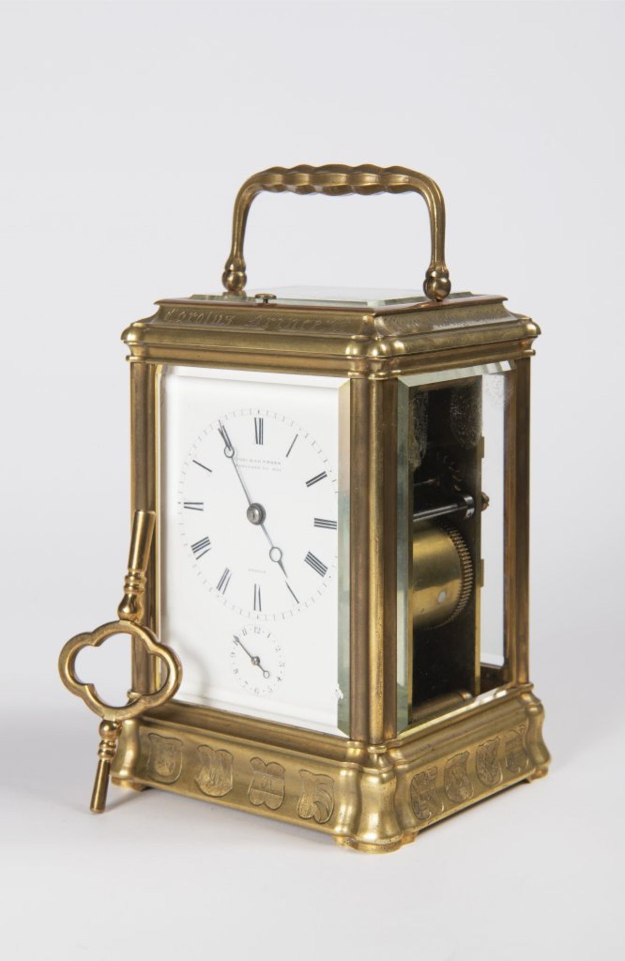 JOHANNES HARTMANN: A TRAVEL ALARM CLOCK IN A CABINET 1861 Germany Berlín Gilt bronze 17,5 x 9 x 8,