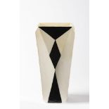 VLASTISLAV HOFMAN 1884 - 1964: AN ANGULAR VASE Before 1914 Soft stoneware, white glaze, black