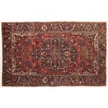 A HERIS RUG 1920s-30s 355 x 233 cm A hand-knotted Person rug from the Heris region in the Iranian