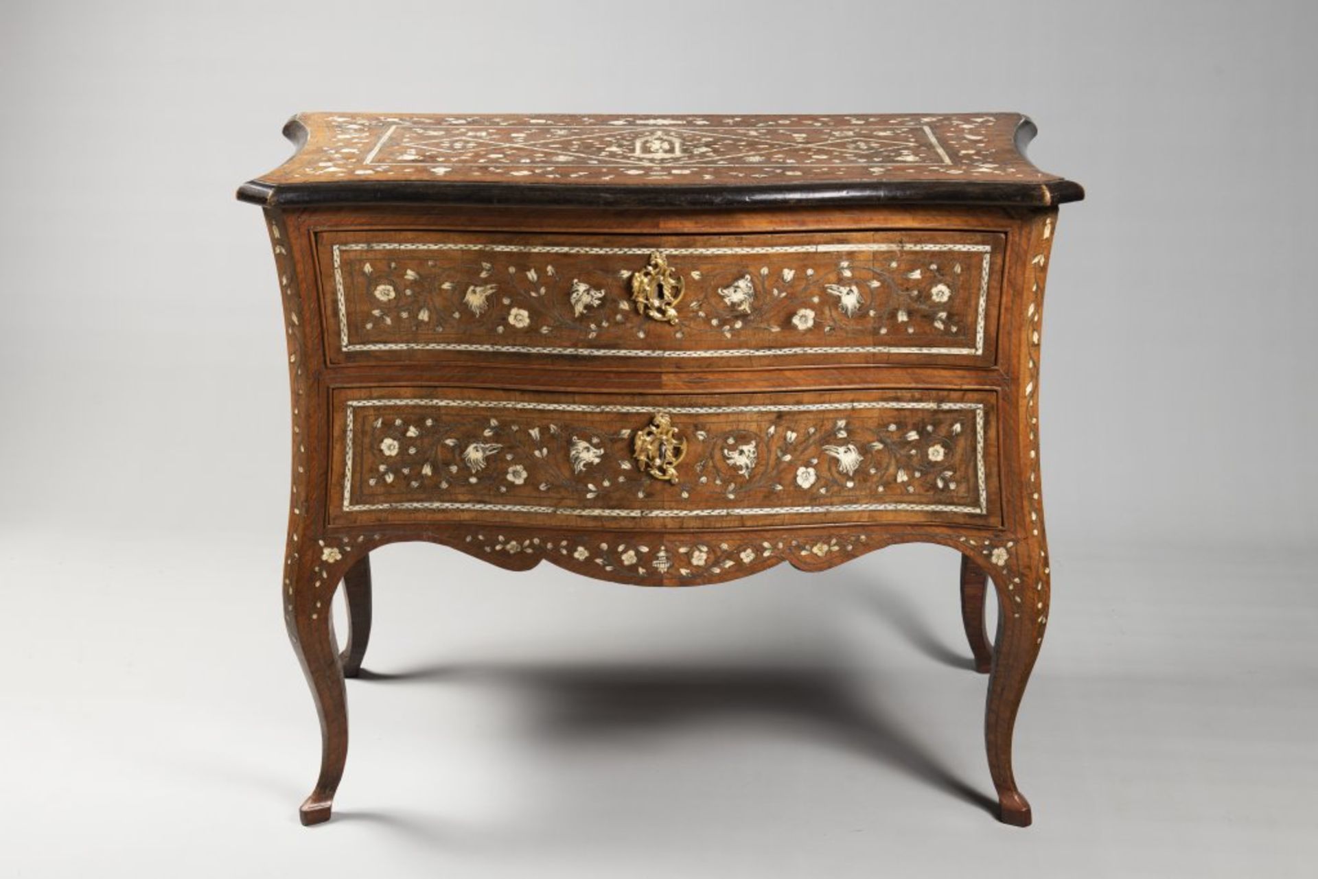 AN ITALIAN ROCOCO COMMODE 18th century Italy Lombardie Walnut, ivory, metal 84 x 102 x 51 cm An