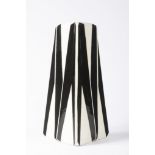 VLASTISLAV HOFMAN 1884 - 1964: A CUBIST VASE Before 1914 Soft stoneware, white glaze, black decor.