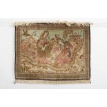 A PERSIAN SILK RUG, depicting ladies at leisure in a landscape surrounded by numerous animals and