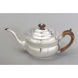 A GEORGE III SILVER TEAPOT, LONDON 1804, H.S., the hinged cover with removable fruitwood finial, C-