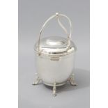 A SILVERPLATE ICE BUCKET, BY SHERIDAN, swing-over handle, hinged cover, plain body, standing on four