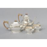 A 20th CENTURY FOUR PIECE SILVER TEA AND COFFEE SERVICE, SHEFFIELD 1973, C.B. & S., comprising: