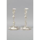 A PAIR OF GEORGE V SILVER CANDLESTICKS, LONDON 1914, D & J.W., plain wax pans, knopped stems