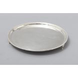 A SILVERPLATE SALVER, of circular form, beaded border, plain well, standing on four applied reeded