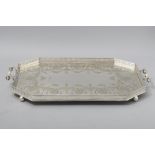 A MAPPIN & WEBB SILVERPLATE GALLERY TRAY, the gallery top with cut-out decoration and attached