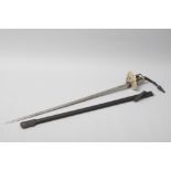 AN ENGLISH DRESS SWORD BY WILKINSON SWORD LTD., the engraved blade bearing the cypher "E II R",