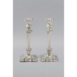 A PAIR OF MAPPIN & WEBB SILVERPLATE CANDLESTICKS, with removable wax pans, embossed knobbed plain